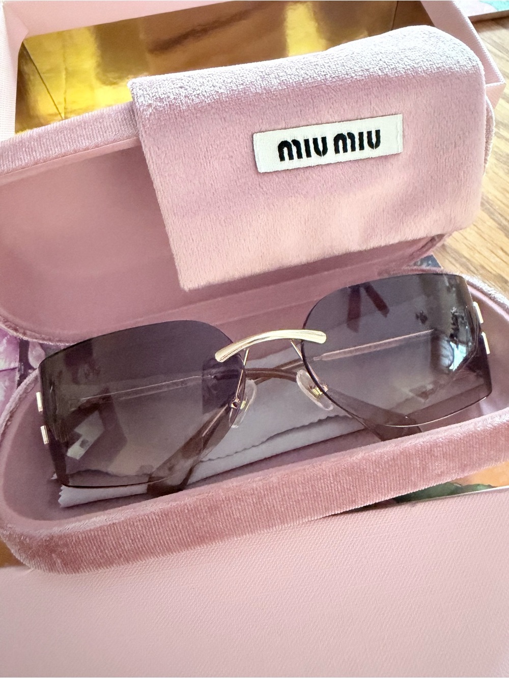 Miu Miu Gold-Bridge Rimless Sunglasses with Gray Gradient Lenses